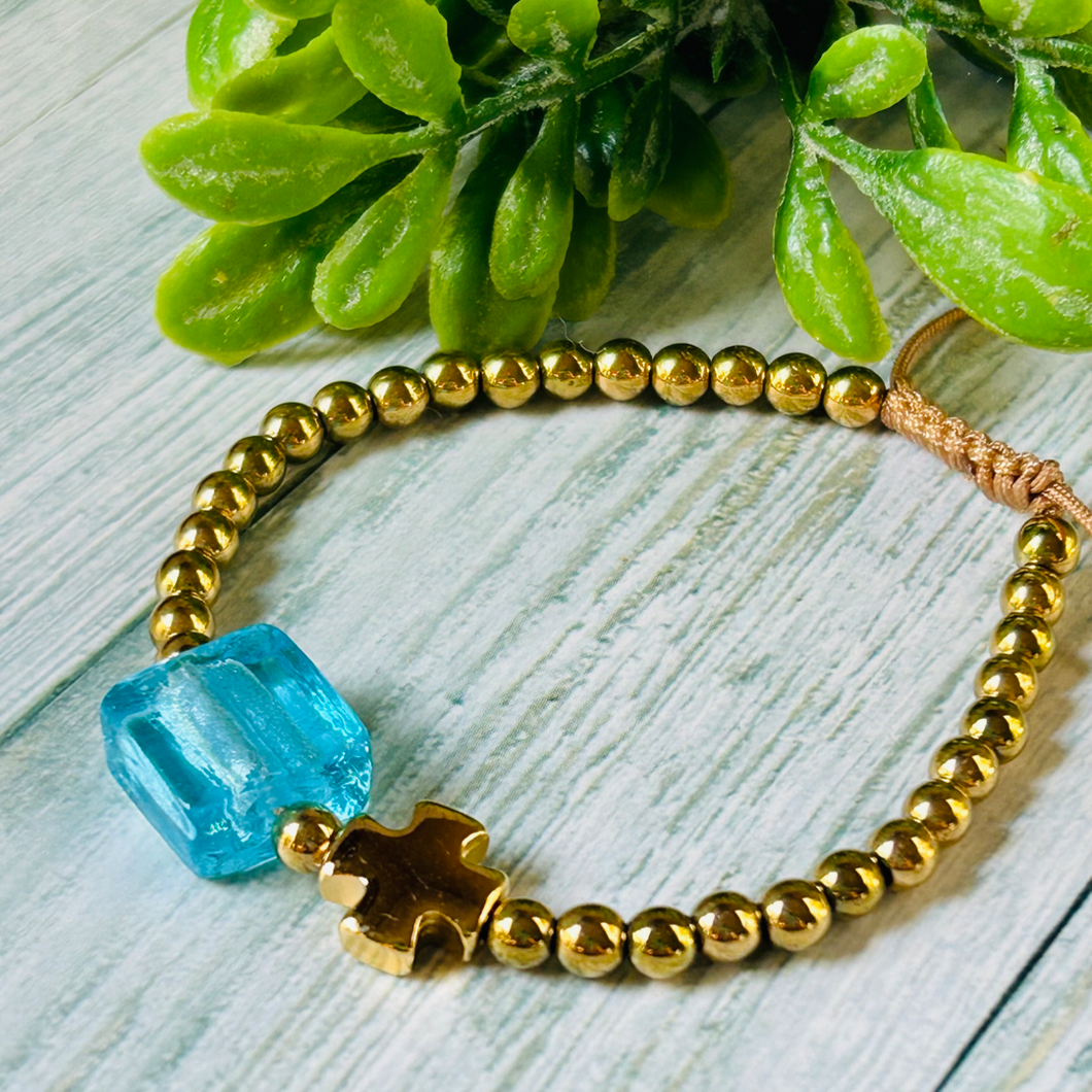 Gold Hematite Cross & Aegean Blue Bead Bracelet